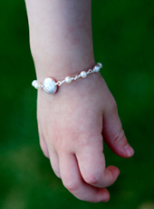 white pearl pink coin baby bracelet
